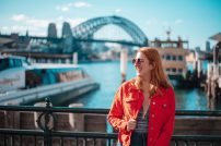 Girl,In,Sydney,With,The,Harbour,Bridge,In,The,Background Girl in Sydney with the harbour bridge in the background